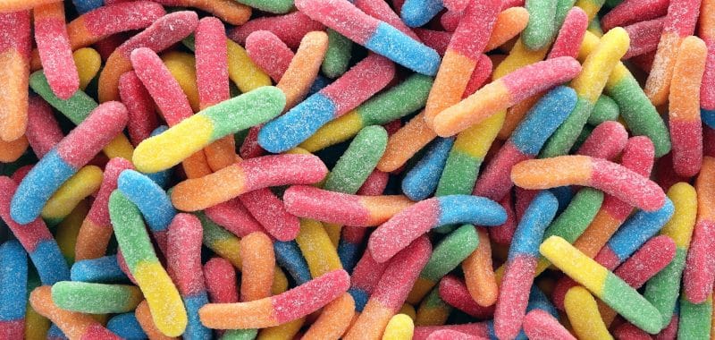 Colourful lolly snakes in pile
